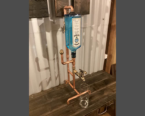 Single spirit dispenser